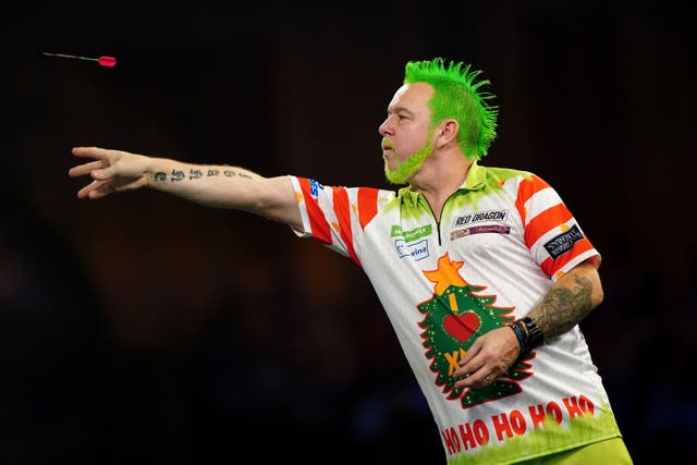 Peter Wright crashed out of the PDC World Darts Championship (Zac Goodwin/PA)
