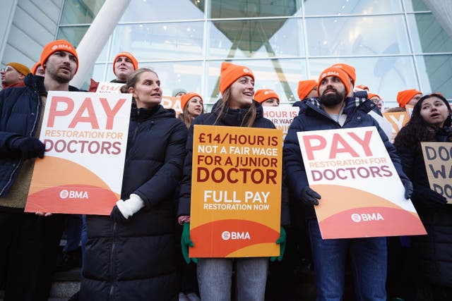 Junior doctors who are members of the British Medical Association on the picket line in London (James Manning/PA)