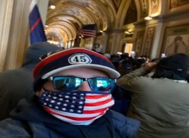 Mr Cudo snapped a selfie inside the Capitol building during the Jan 6 riots