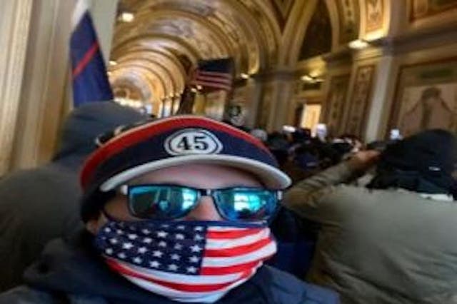 <p>Martin Cudo shared his selfie to social media inside the Capitol </p>