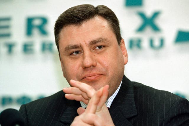 <p>Mikhail Trushin, first deputy president of Yukos, addressing a news conference in Moscow in 2004</p>