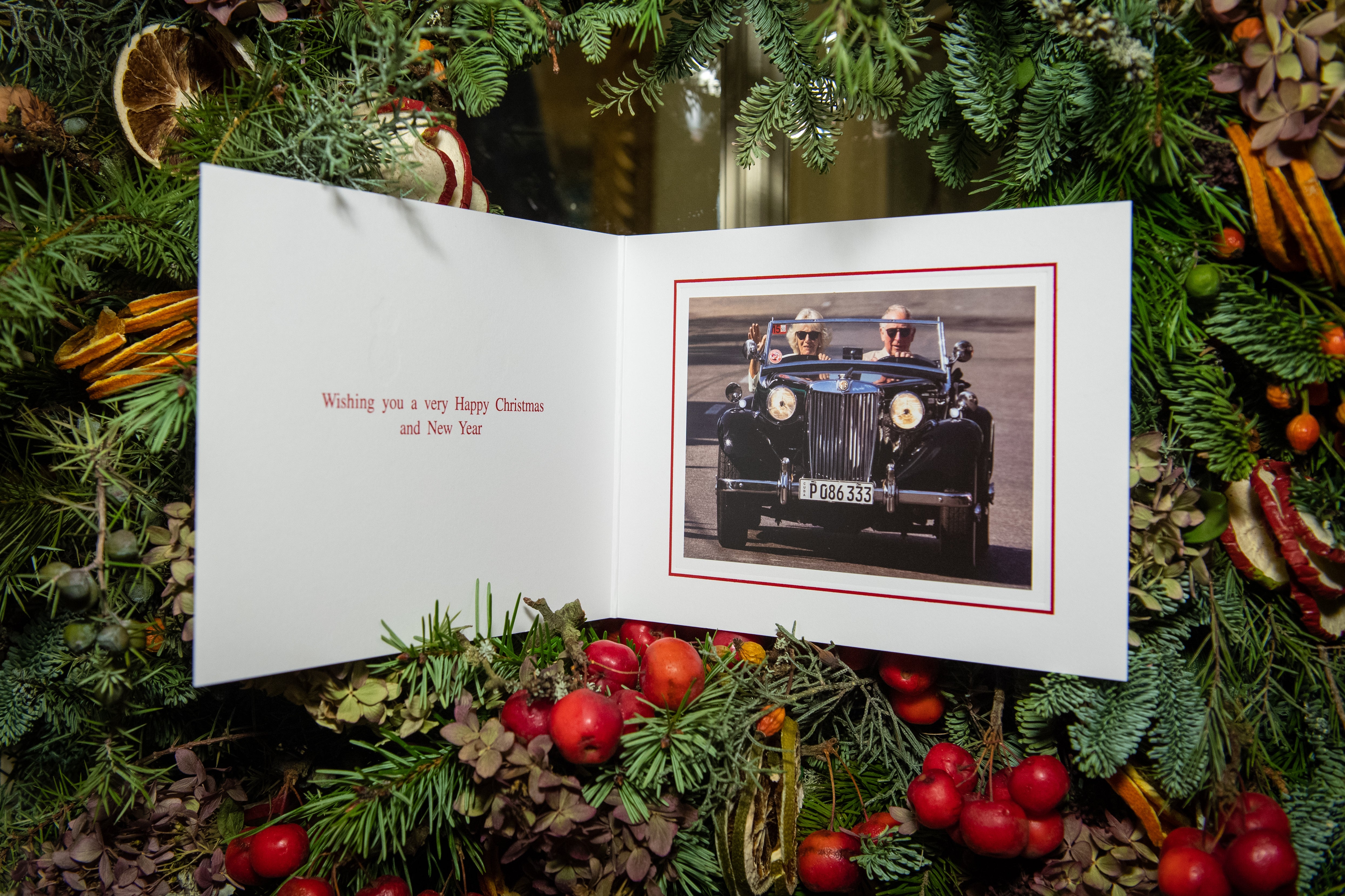 The 2019 Christmas card of Prince Charles and Camilla featuring a photograph of the royal couple driving a vintage MG TD whilst on tour in Cuba