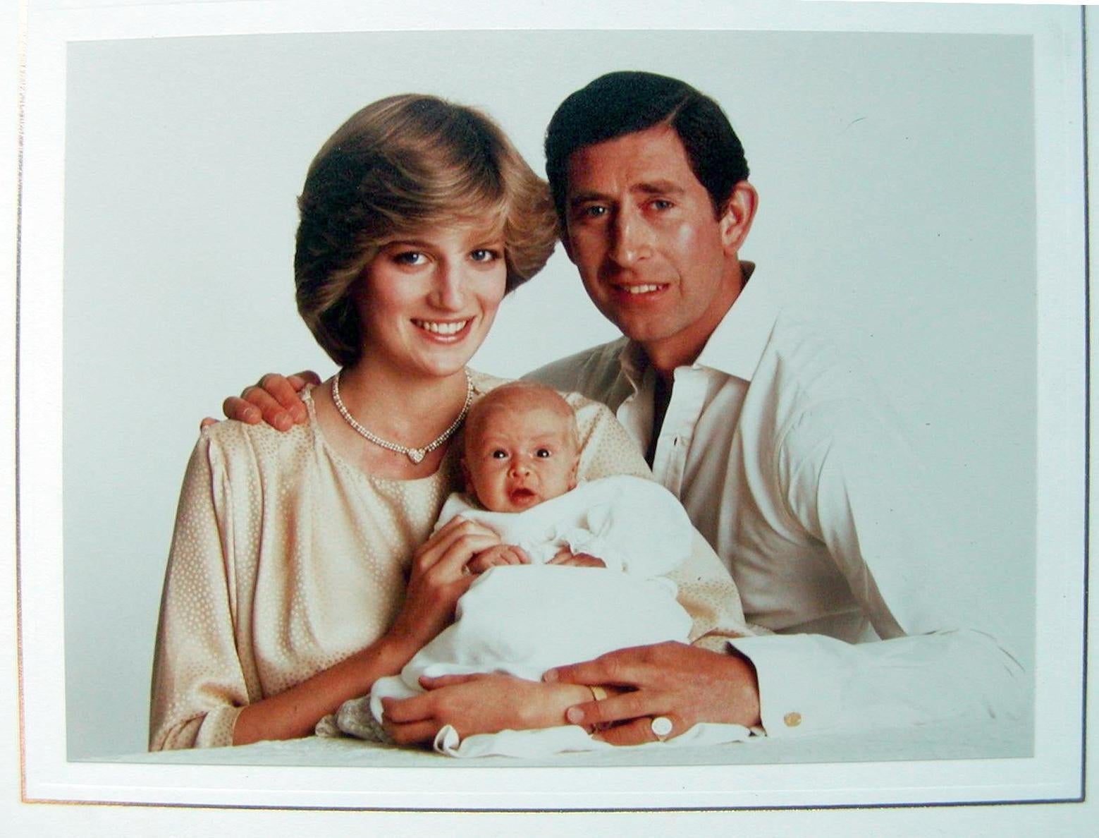 Royal Christmas card bearing a full-color family photograph of Prince Charles, Princess Diana, and the infant Prince William from 1982