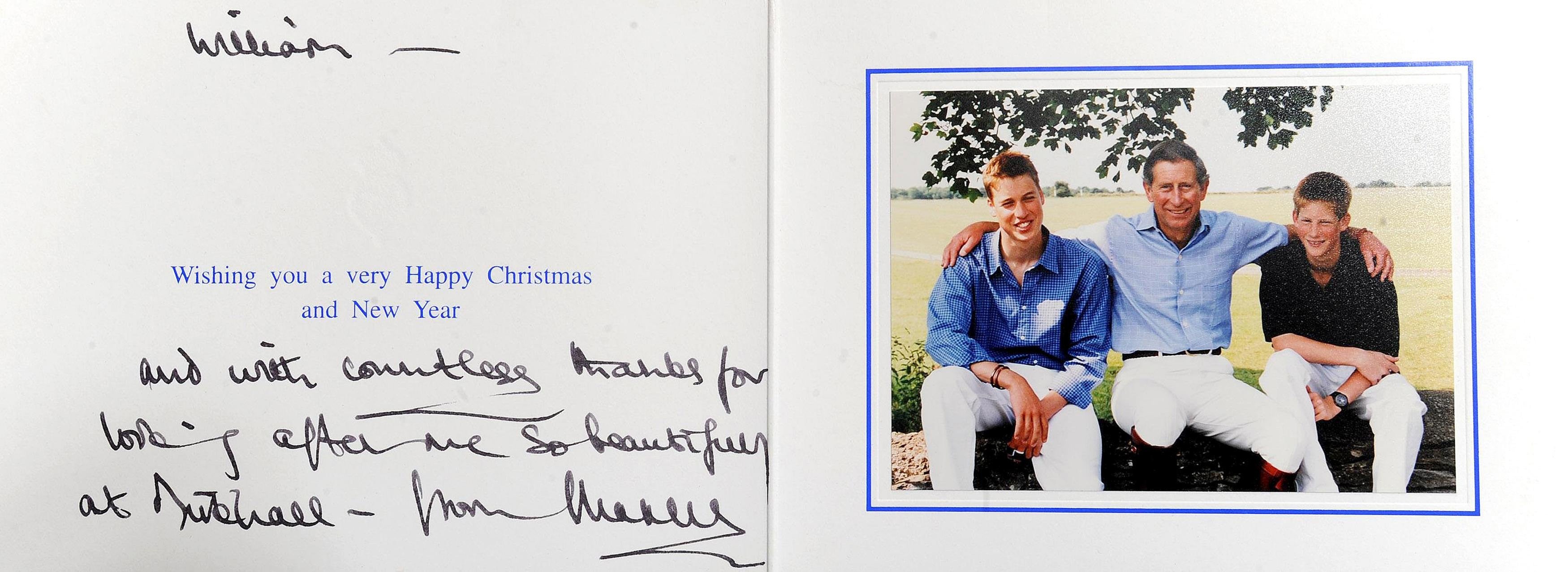 Prince Charles put his arms around his sons in this photo on the front of his 1999 Christmas card