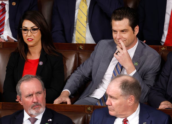 U.S. Rep. Lauren Boebert (R-FL) (L) and Rep. Matt Gaetz (R-FL) sit together as the House of Representatives elects a new Speaker of the House at the U.S. Capitol Building on October 17, 2023 in Washington, DC
