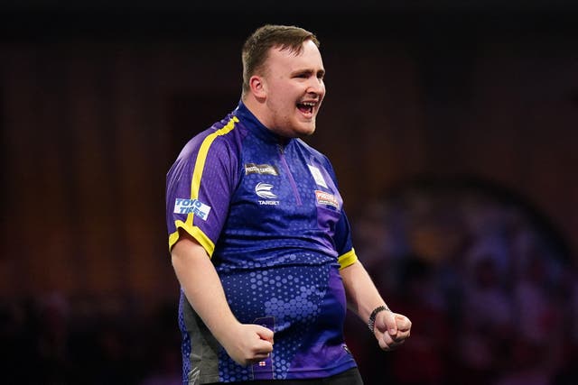 Luke Littler reacts during his match against Andrew Gilding (Zac Goodwin/PA)