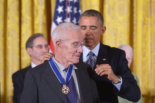 <p>US President Barack Obama presents the Medal of Freedom to economist Robert Solow during a ceremony in the East Room of the White House on November 24, 2014 in Washington, DC</p>