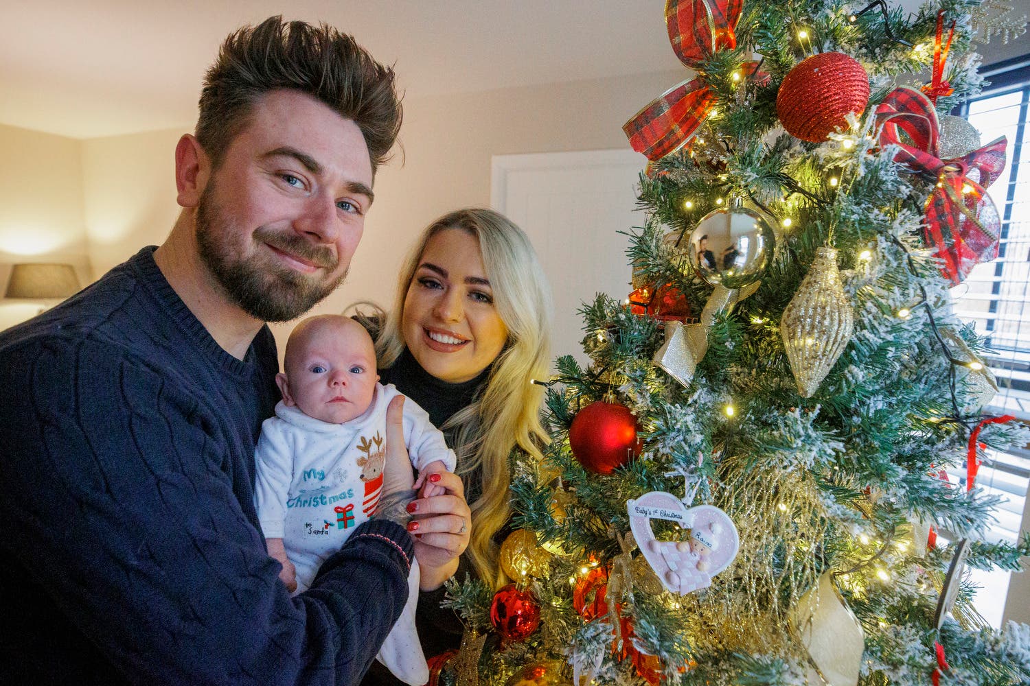 Marcus and Rachel Gilmore with the daughter Raina at their home outside Ballyclare (Liam McBurney/PA)