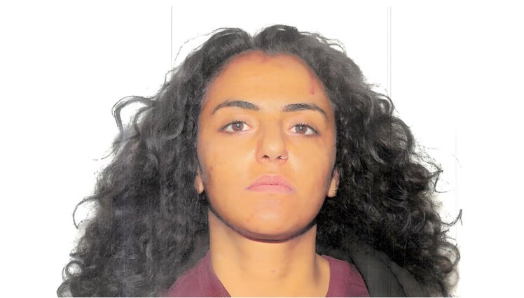 Hend Bustami in mug shot after her arrest for murder