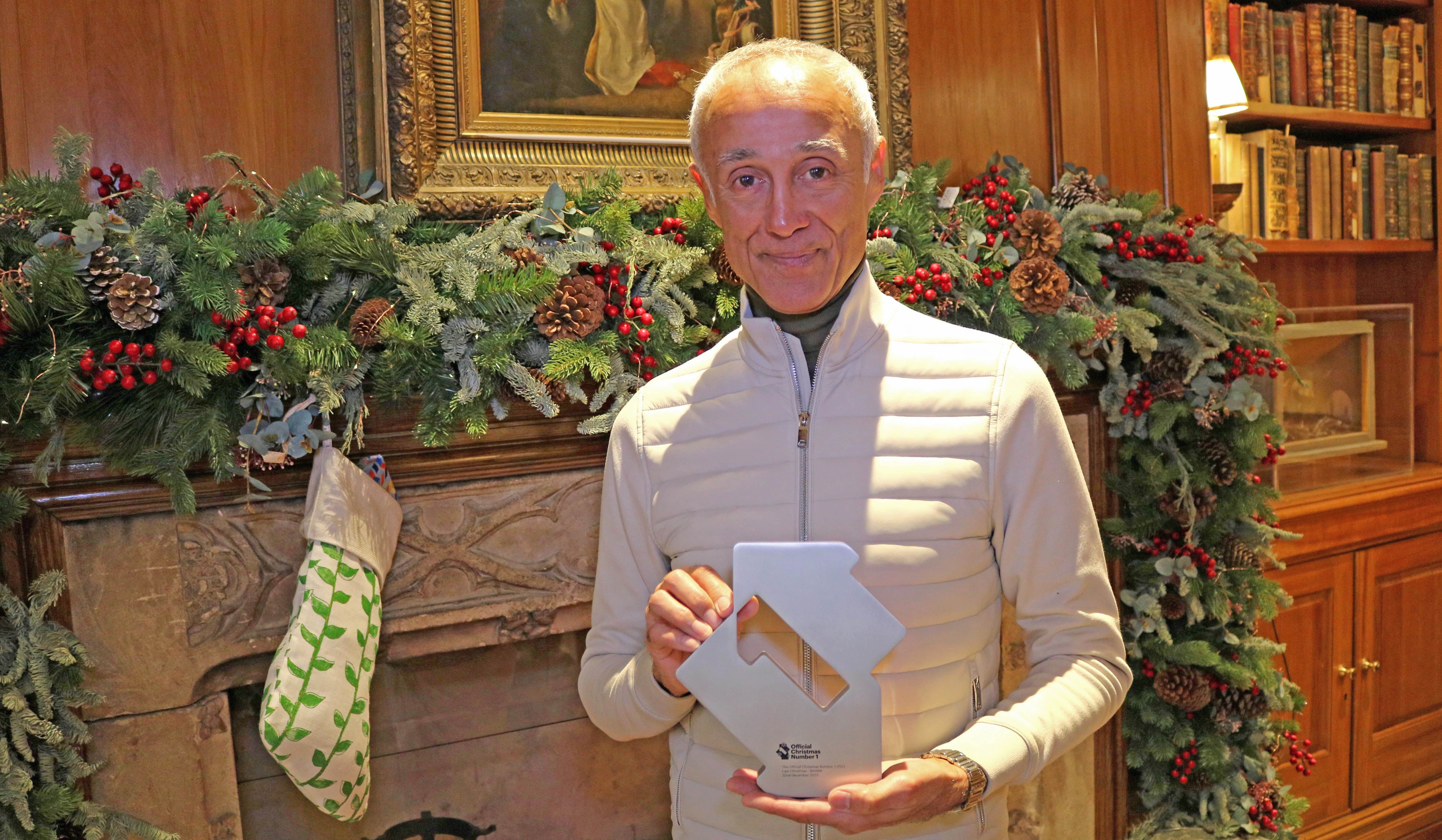 Andrew Ridgeley with his trophy for Christmas No 1 2023