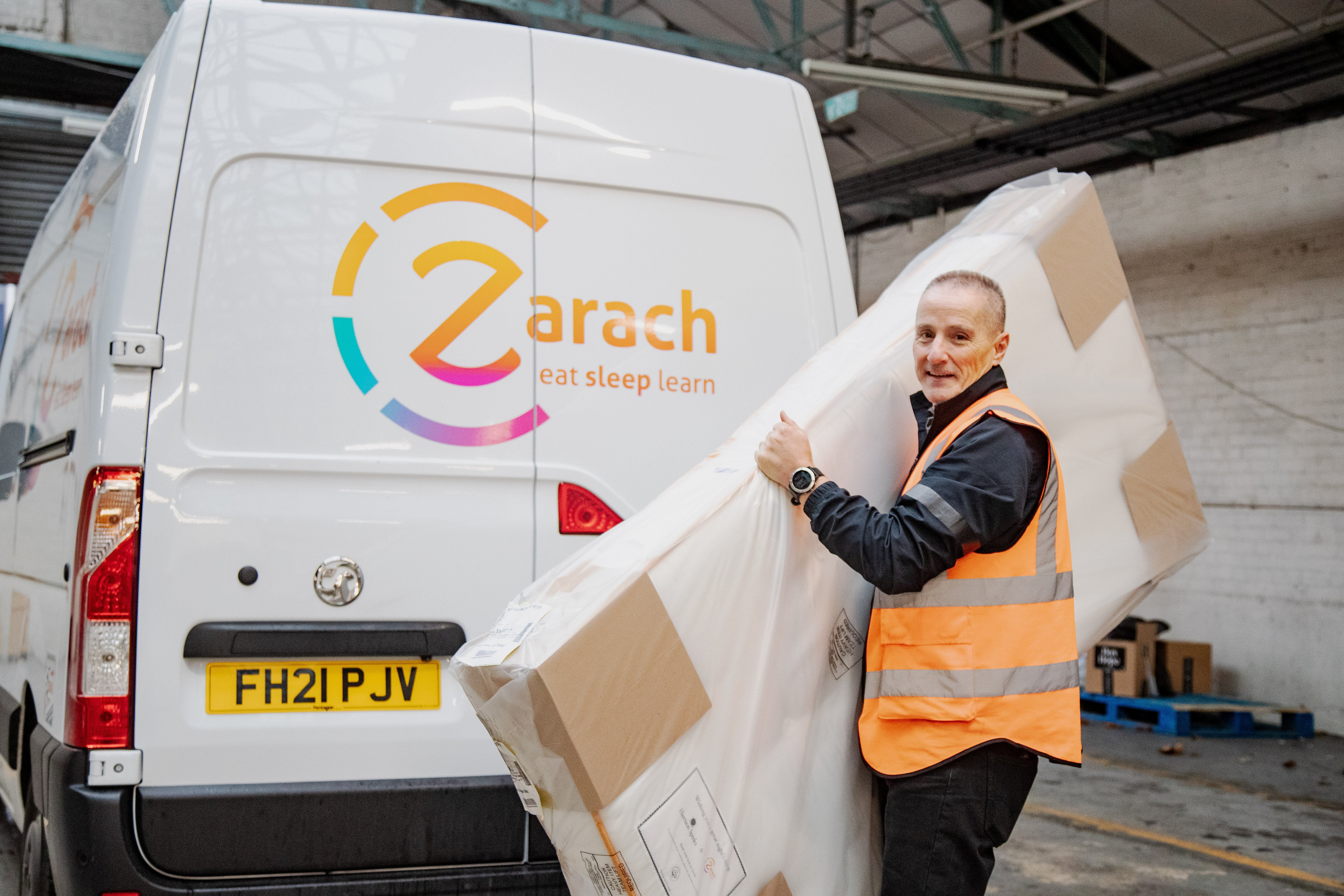 Volunteers deliver beds after schools refer a family to Zarach for support