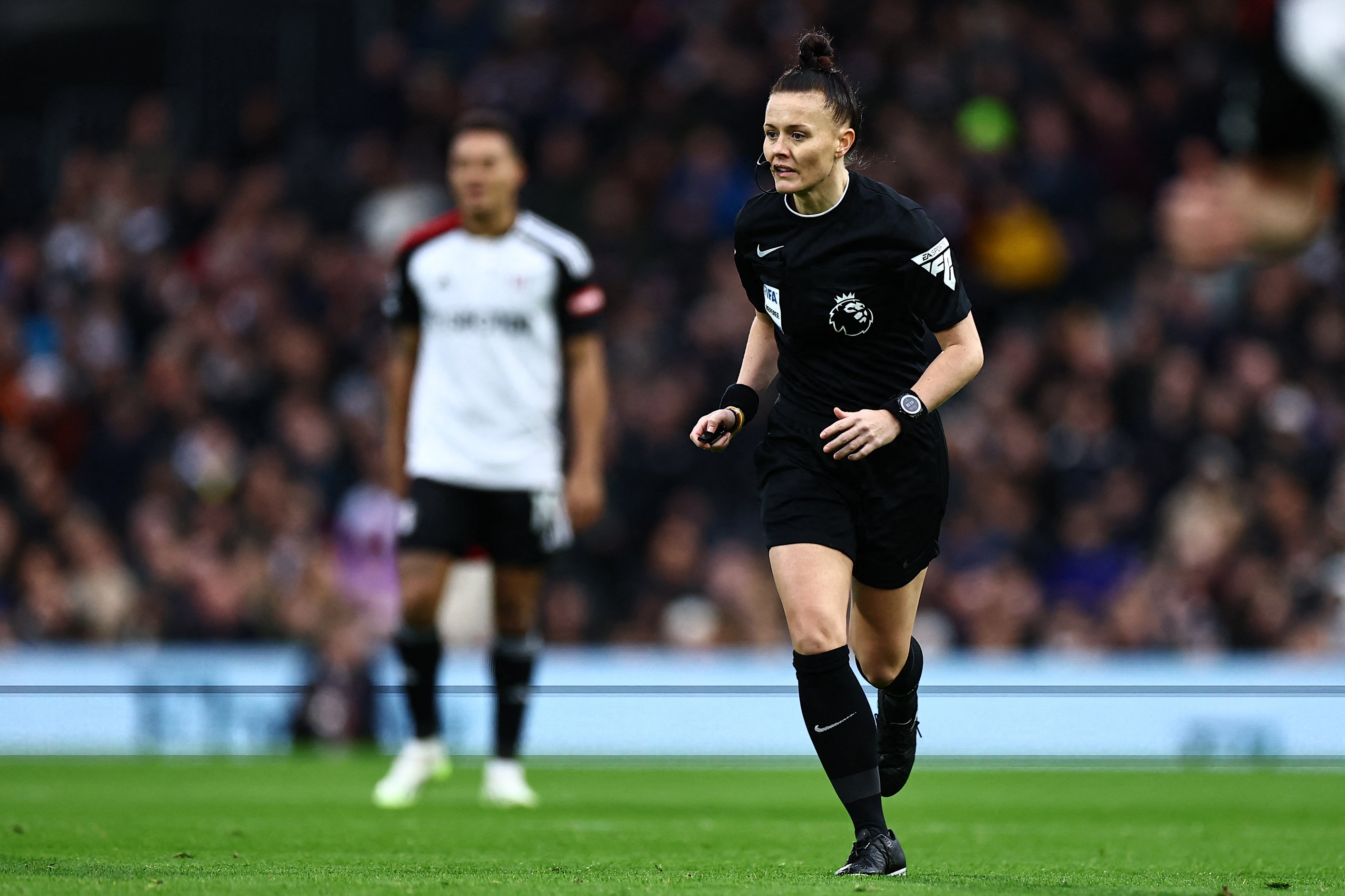 English referee Rebecca Welch officiating in her first premier league game