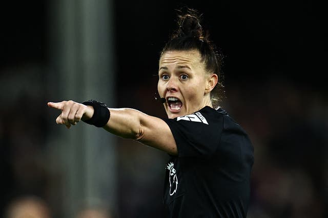 <p>Referee Rebecca Welch gestures during the English Premier League match between Fulham and Burnley</p>
