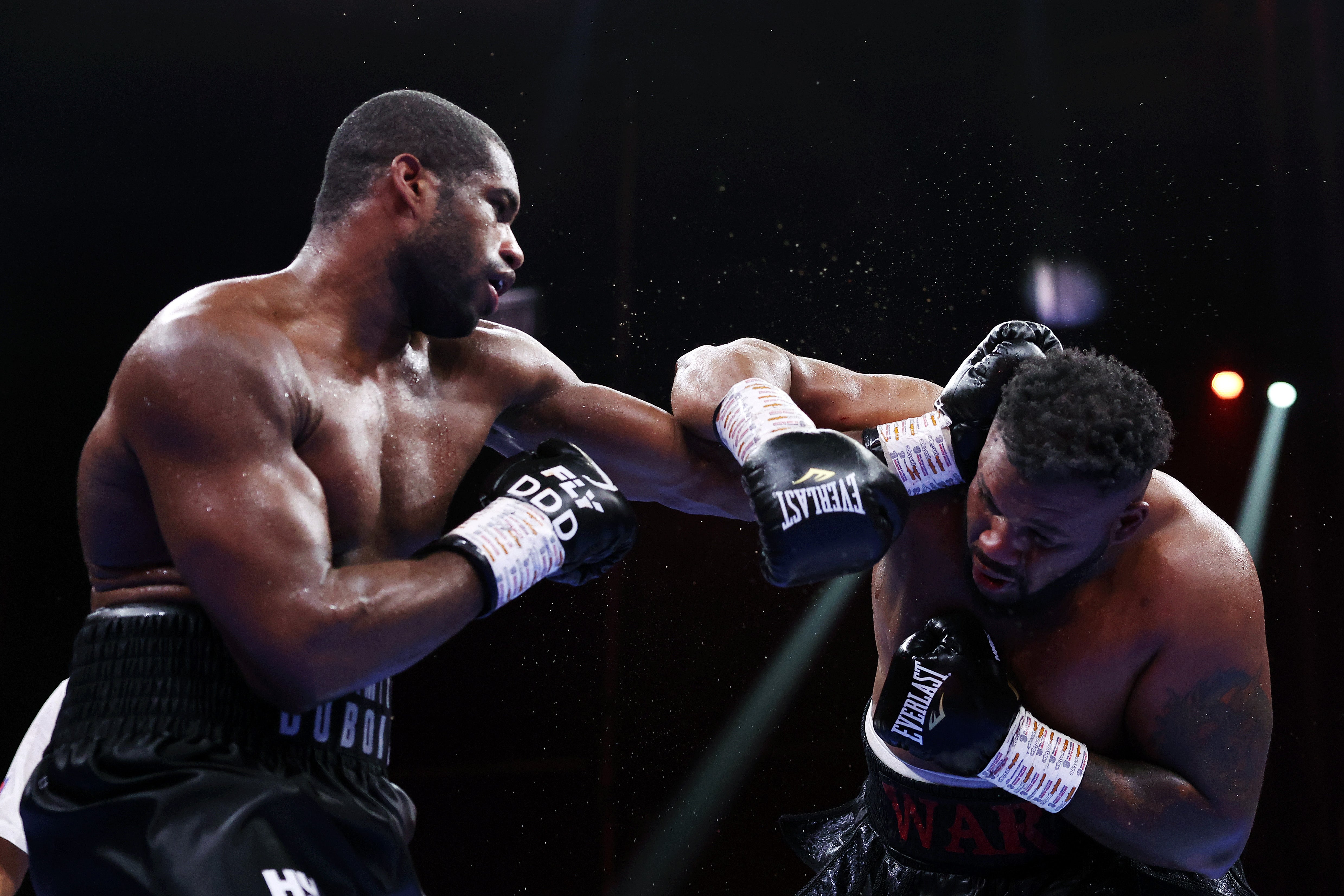 Dubois (left) stopped Jarrell Miller in the final seconds of their back-and-forth bout