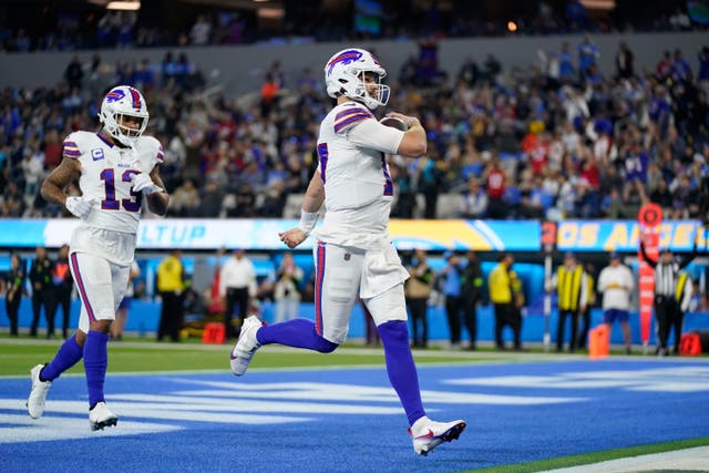 Buffalo Bills quarterback Josh Allen scores a rushing touchdown Ashley Landis)