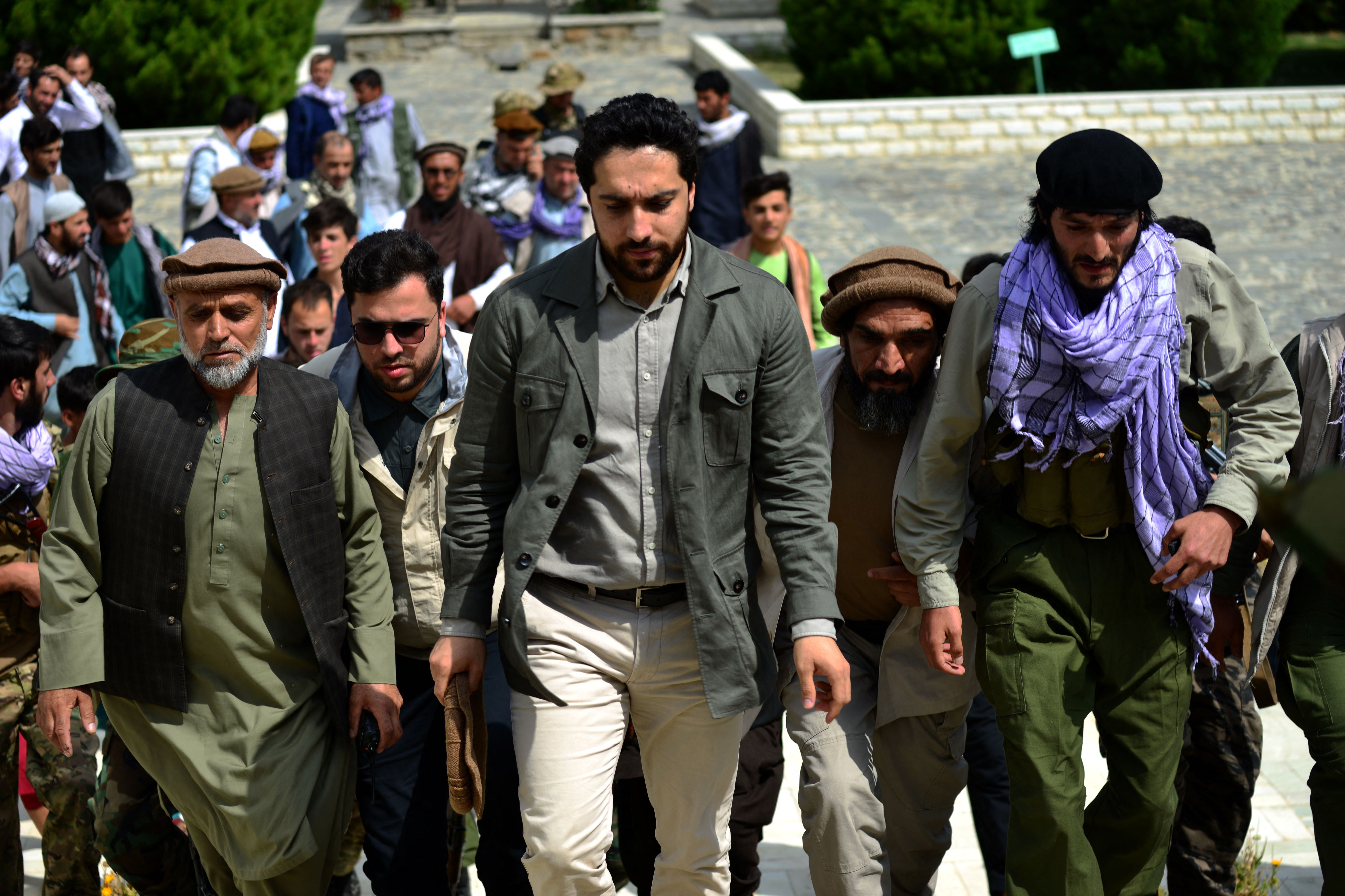Massoud (centre) arrives to address a gathering at the tomb of his late father in Panjshir province in July 2021, before Kabul fell to the Taliban
