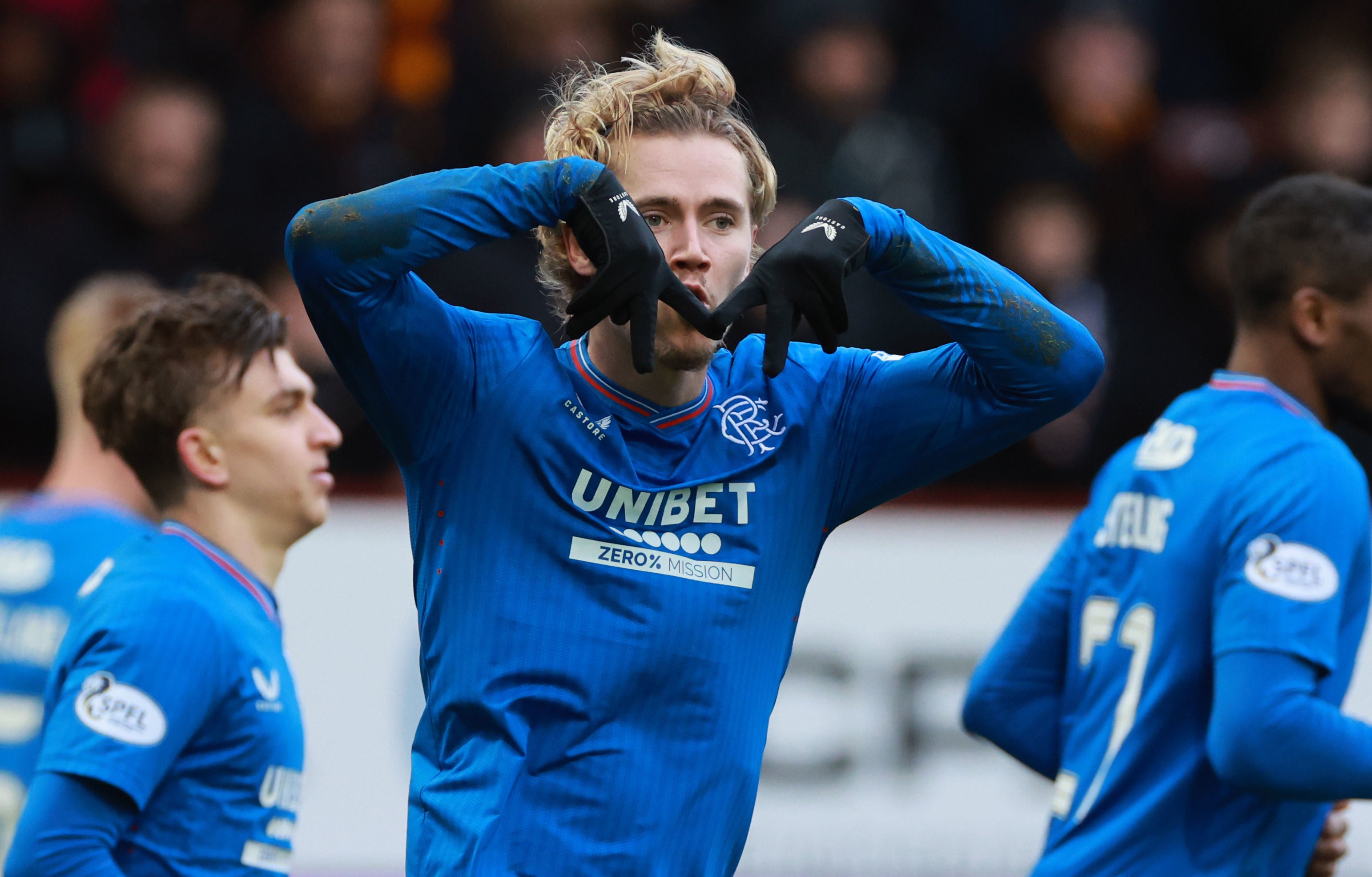 Rangers close the gap on Celtic with wet and wild win over Motherwell ...