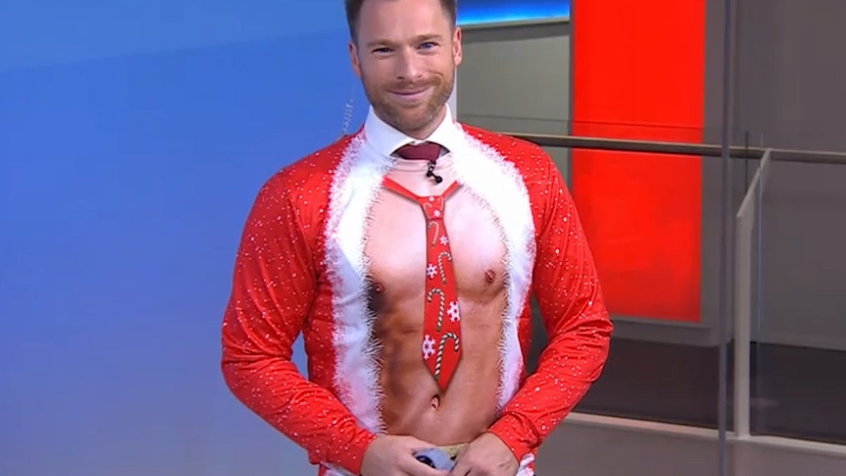 Sky News presenter wearing fake six-pack shirt delivers Christmas Eve news
