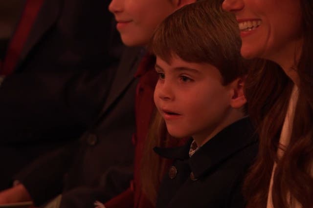 <p>Prince Louis sits beside his mother, Catherine, Princess of Wales at the Royal Carols</p>