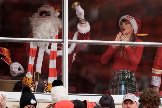 Taylor Swift (right) ahead of the Christmas Day clash (AP Photo/Charlie Riedel)