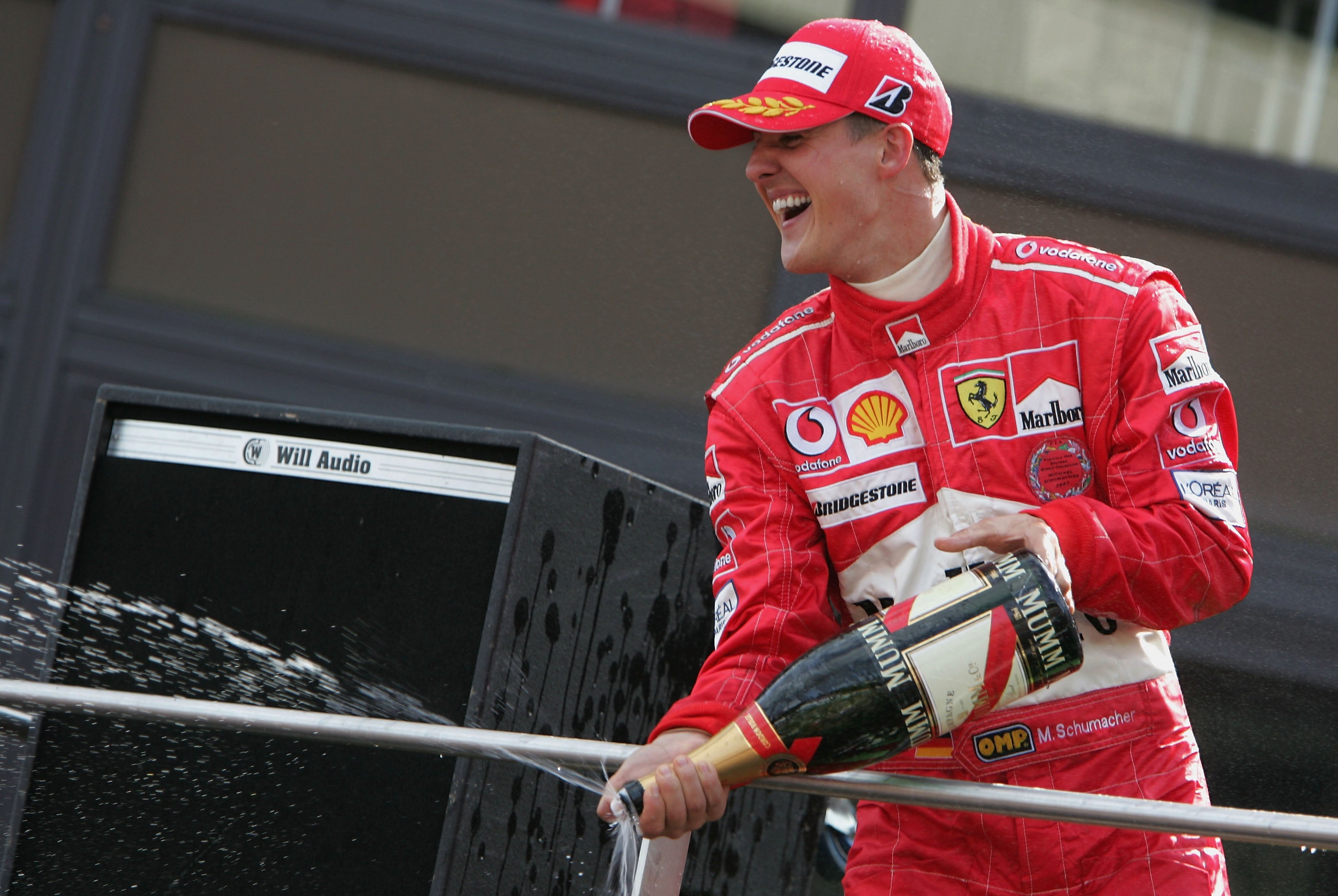 Schumacher celebrates his seventh F1 world title at Spa in 2004