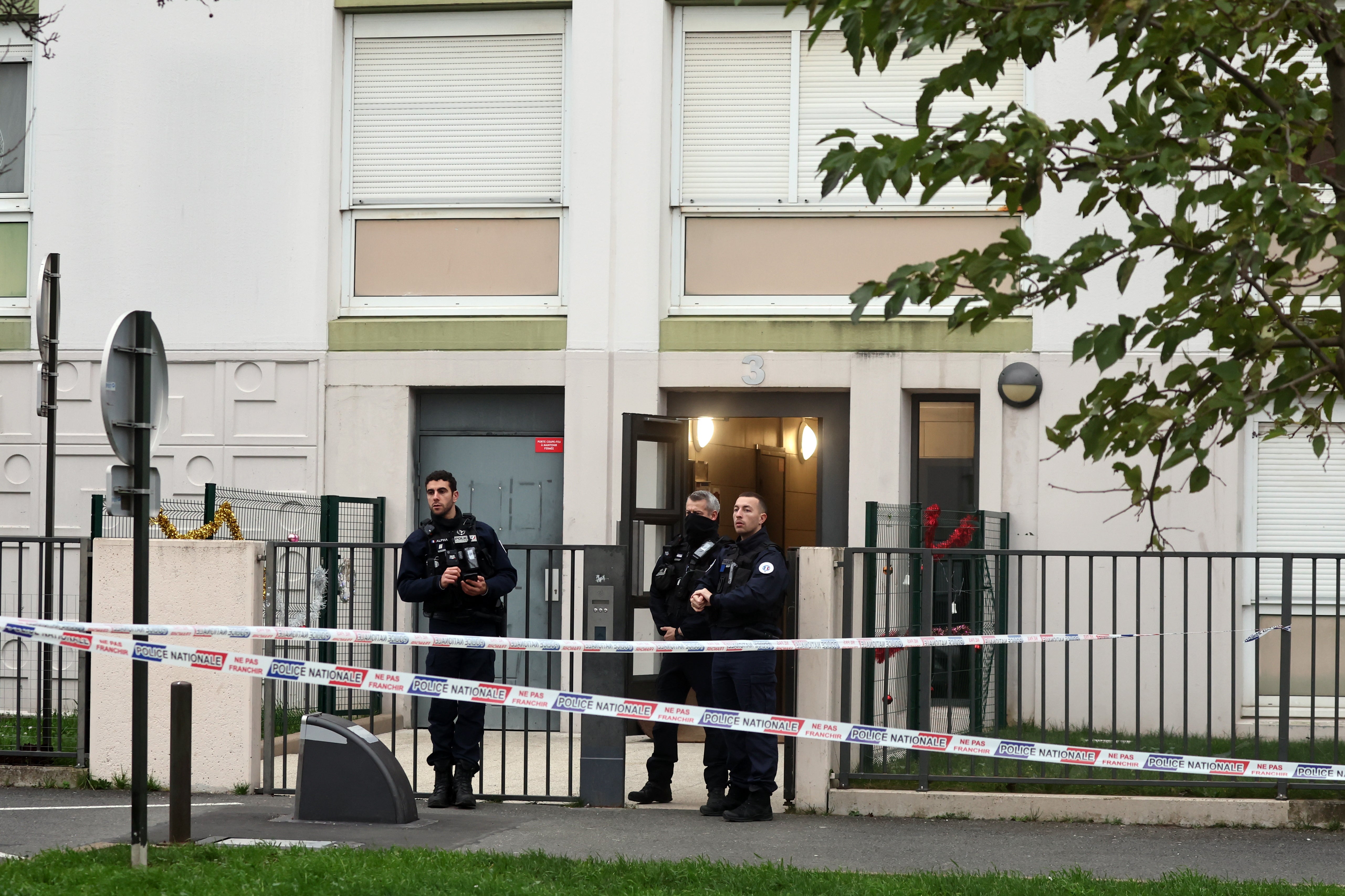 French police patrolled the building where five bodies were found dead in Meaux