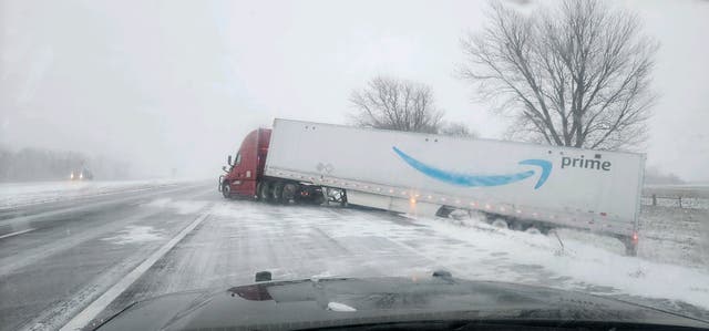 <p>A semi-truck slid partially off the road on Interstate 80 in Nebraska due to dangerous weather conditions</p>