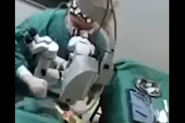 <p>Screengrab. Video of a surgeon punching an 82-year-old patient in China has gone viral</p>
