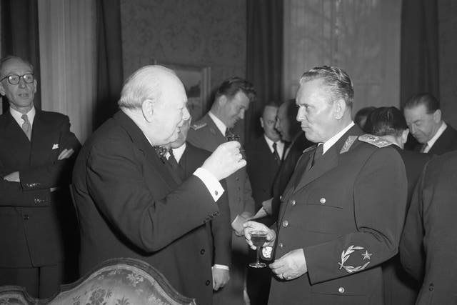 <p>Winston Churchill raises a glass to toast Marshal Tito at the Yugoslav embassy in Kensington 1953 </p>