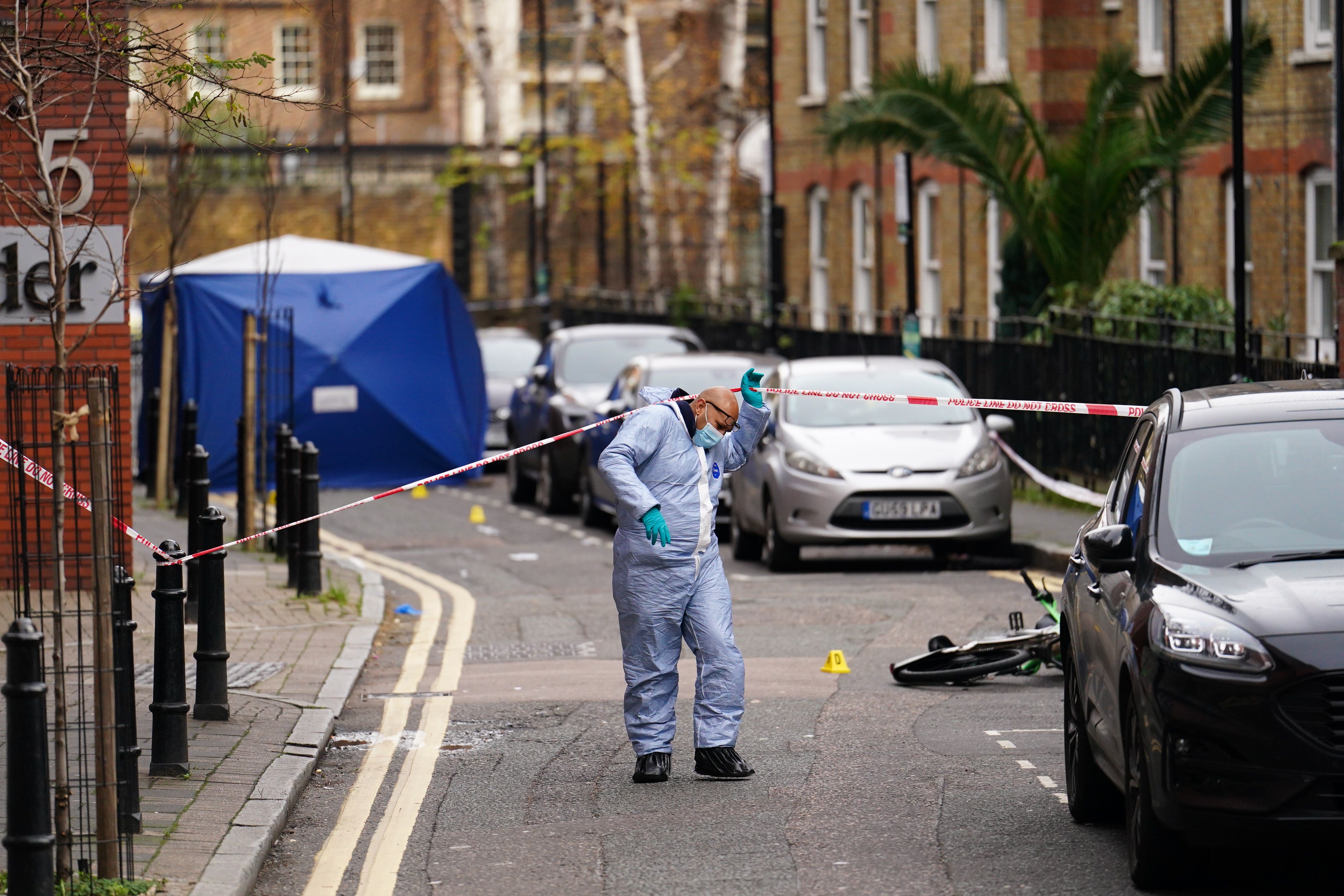 Police at the scene of the incident on Cranwood Street, Hackney (Jordan Pettitt/PA)