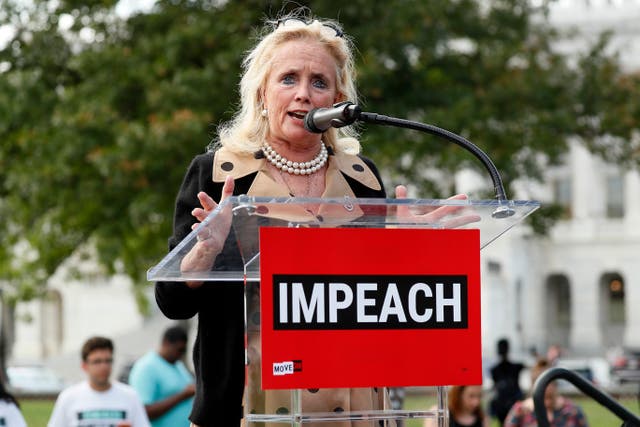 <p>Democratic Representative Debbie Dingell, of Michigan, speaks at the Impeachment Now! rally in support of the impeachment of Donald Trump in September 2019 </p>
