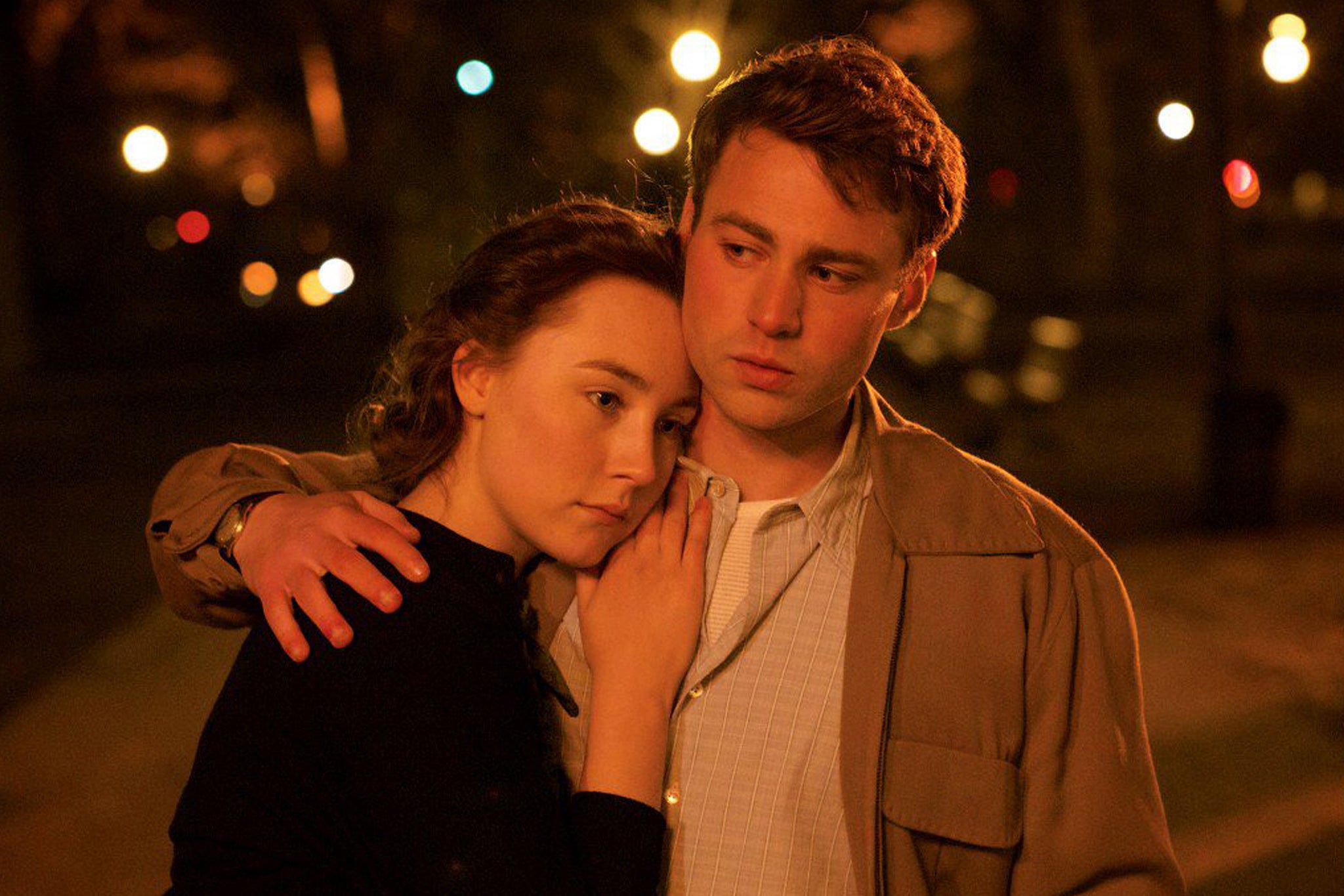 Adult breakthrough: Ronan embraces Emory Cohen in her 2015 film ‘Brooklyn’