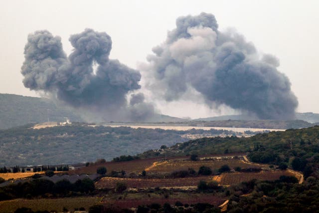 <p>Smoke is seen billowing in the southern Lebanese village of Marwahin after an Israeli strike </p>