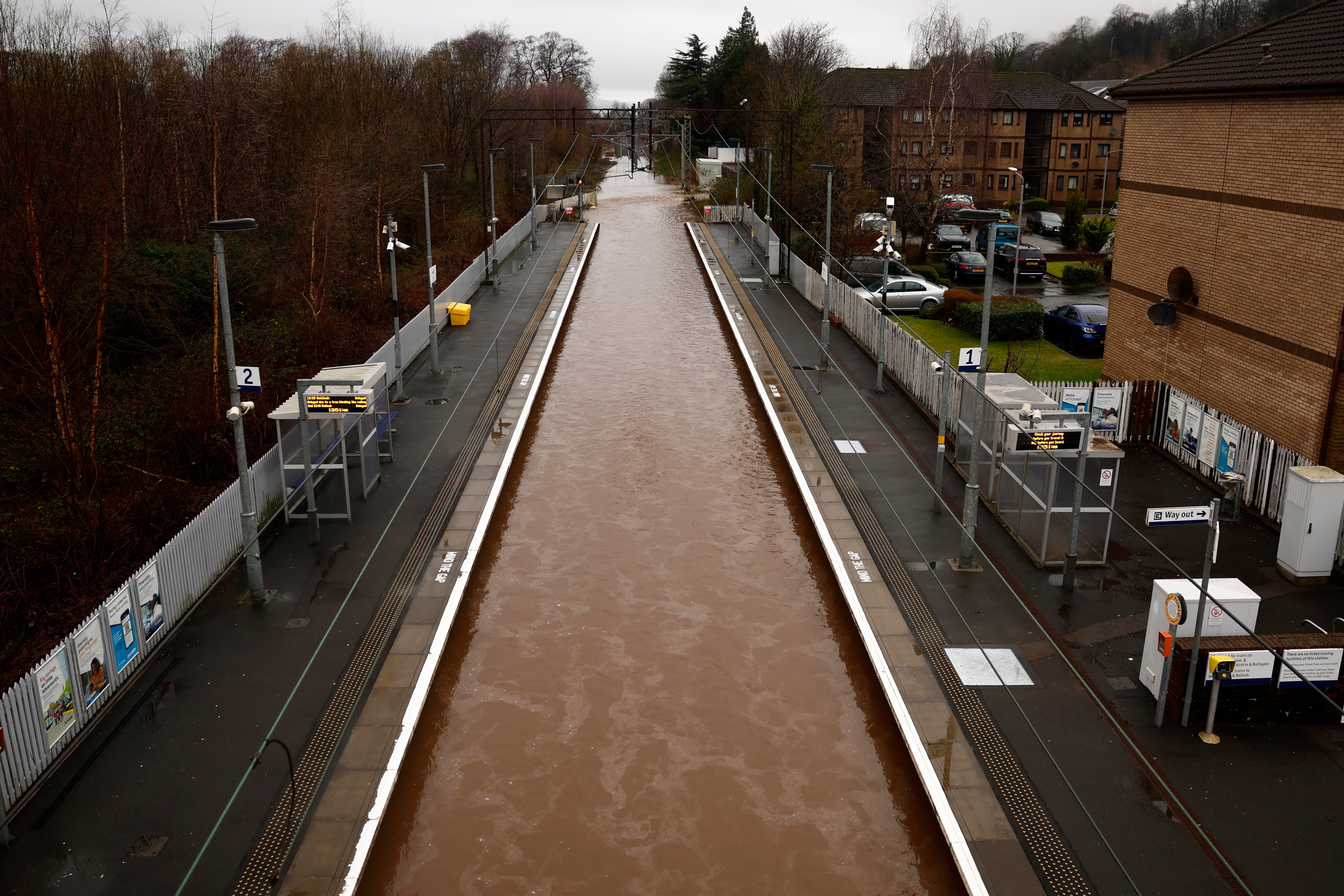 pThe tracks at Bowling train station were completely submerged by floodwaters /p