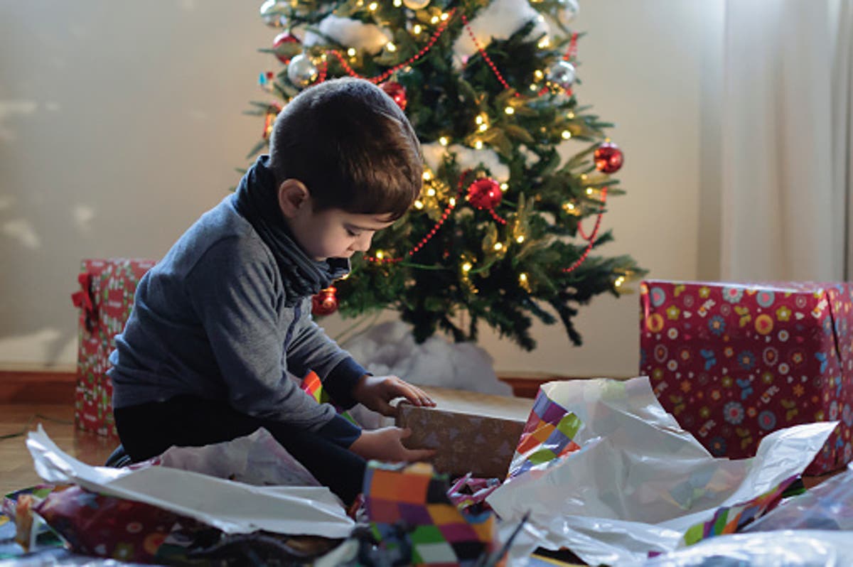 Parents come downstairs to find toddler opened every present under Christmas tree