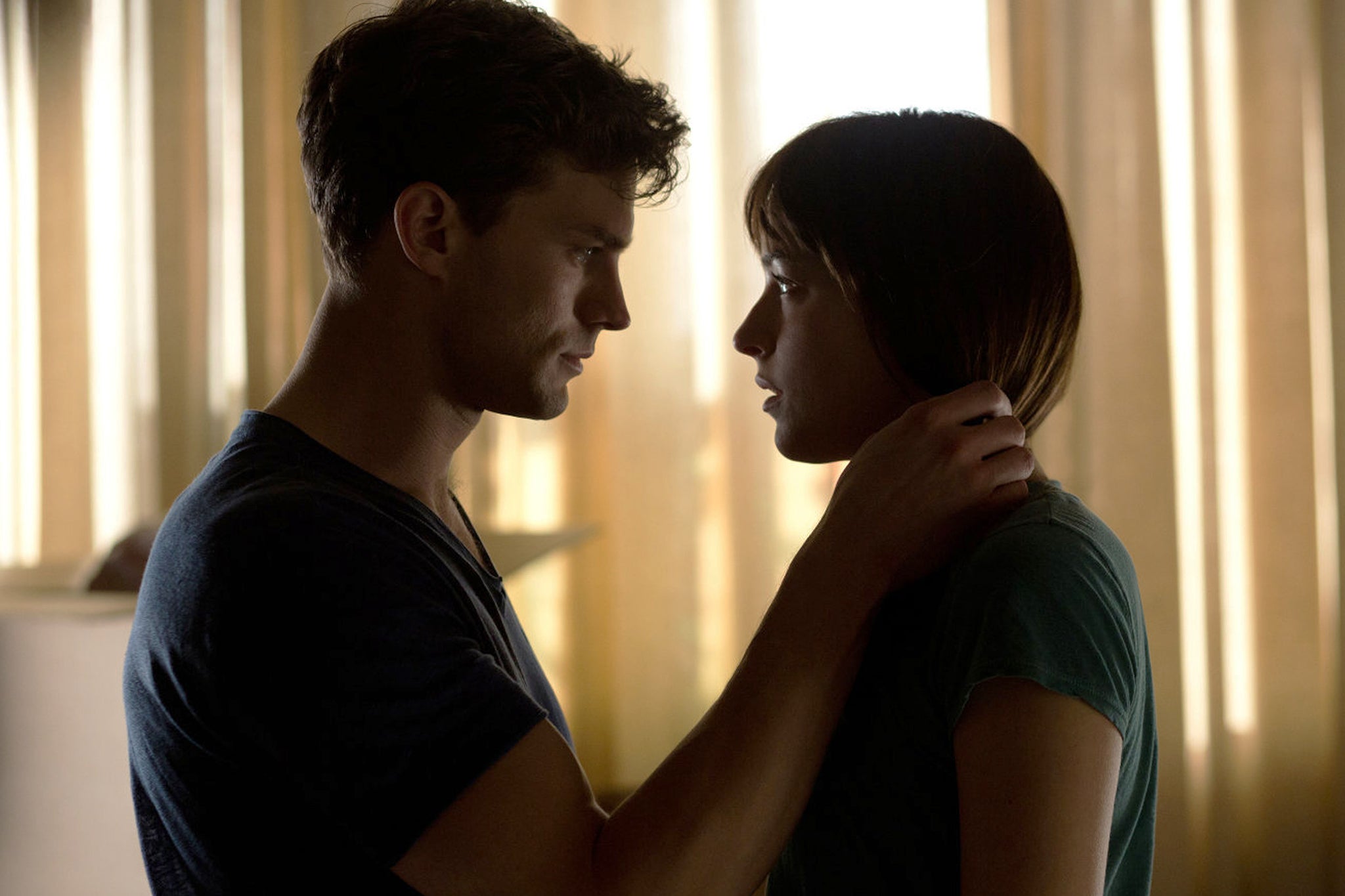 Firm grip on things: Dornan and Dakota Johnson in the world-shaking bonkbuster ‘Fifty Shades of Grey’