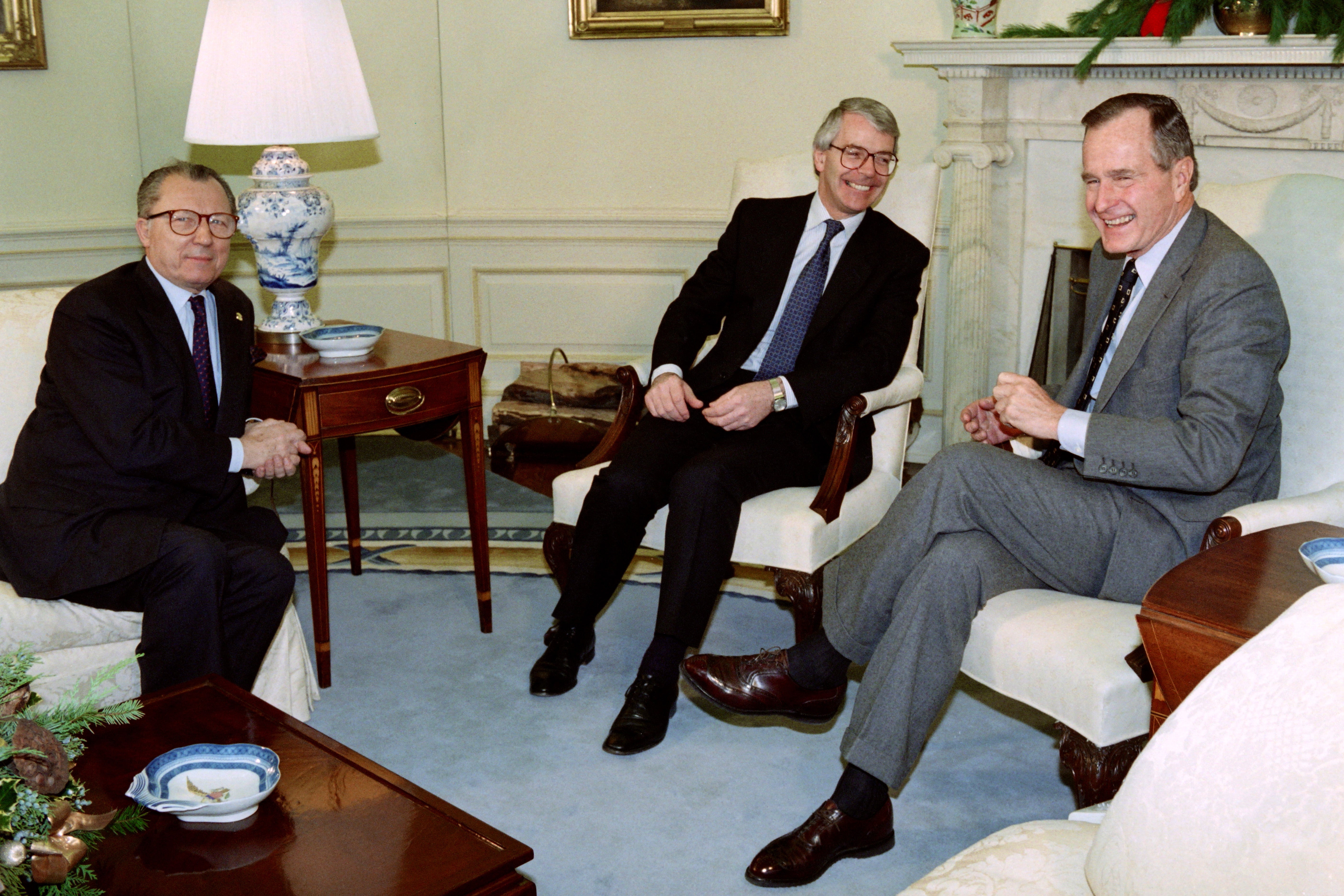 Mr Delors with then prime minister John Major and US president George HW Bush in 1992