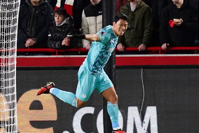 Hwang Hee-chan celebrates scoring Wolves’ second goal (John Walton/PA)