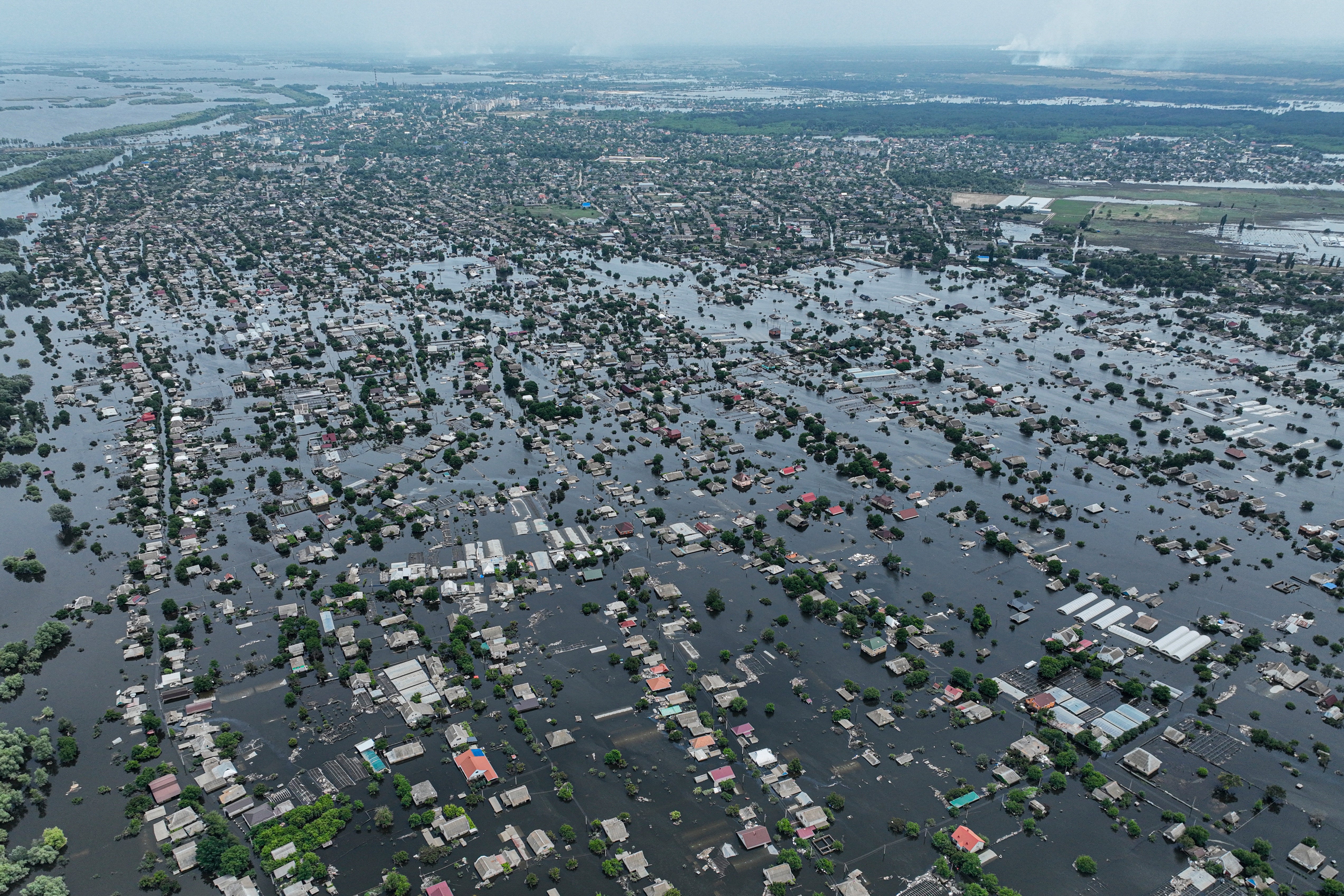 Houses are seen underwater in the flooded town of Oleshky, Ukraine, after the Kakhovka dam was destroyed