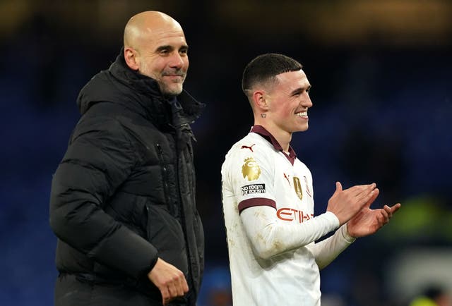 <p>City manager Pep Guardiola with young talent Phil Foden</p>