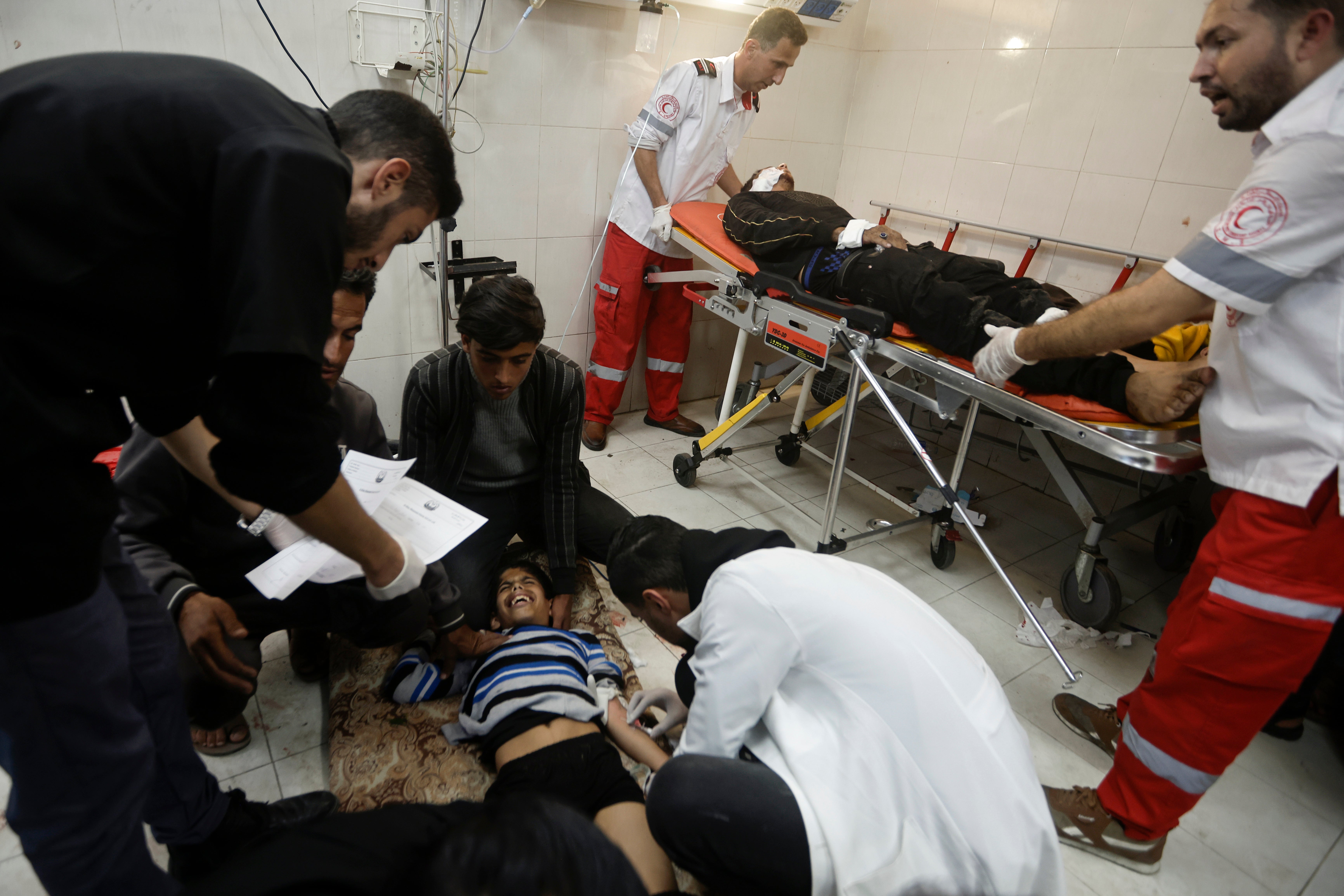 <p>A wounded child is among those to receive treatment in hospital in Khan Younis, Gaza </p>