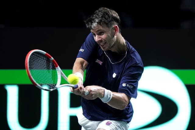 Cameron Norrie in action against Serbia’s Novak Djokovic at the Davis Cup Finals (Adam Davy/PA)