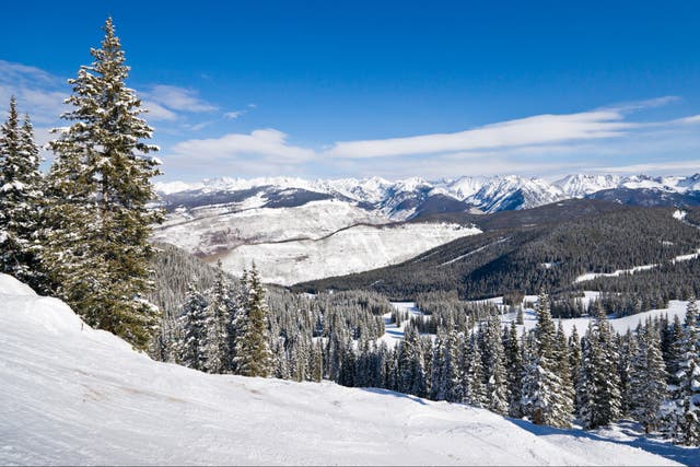 <p>A view of ski slopes in Colorado. A resort in Aspen had sued a UK designer for sending influencers to its slopes</p>