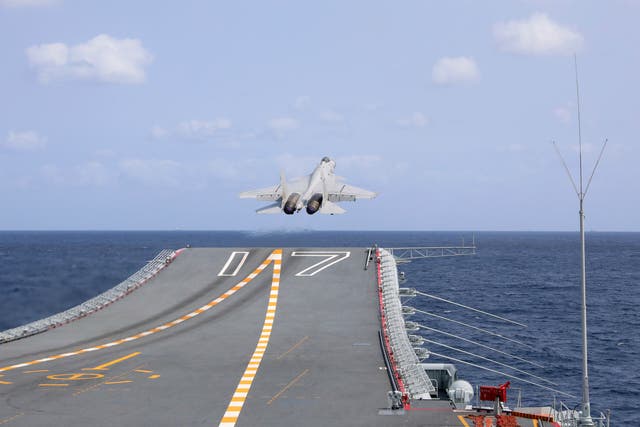 <p>A Chinese fighter jet takes off from the Shandong aircraft carrier during an exercise on 19 April 2023</p>
