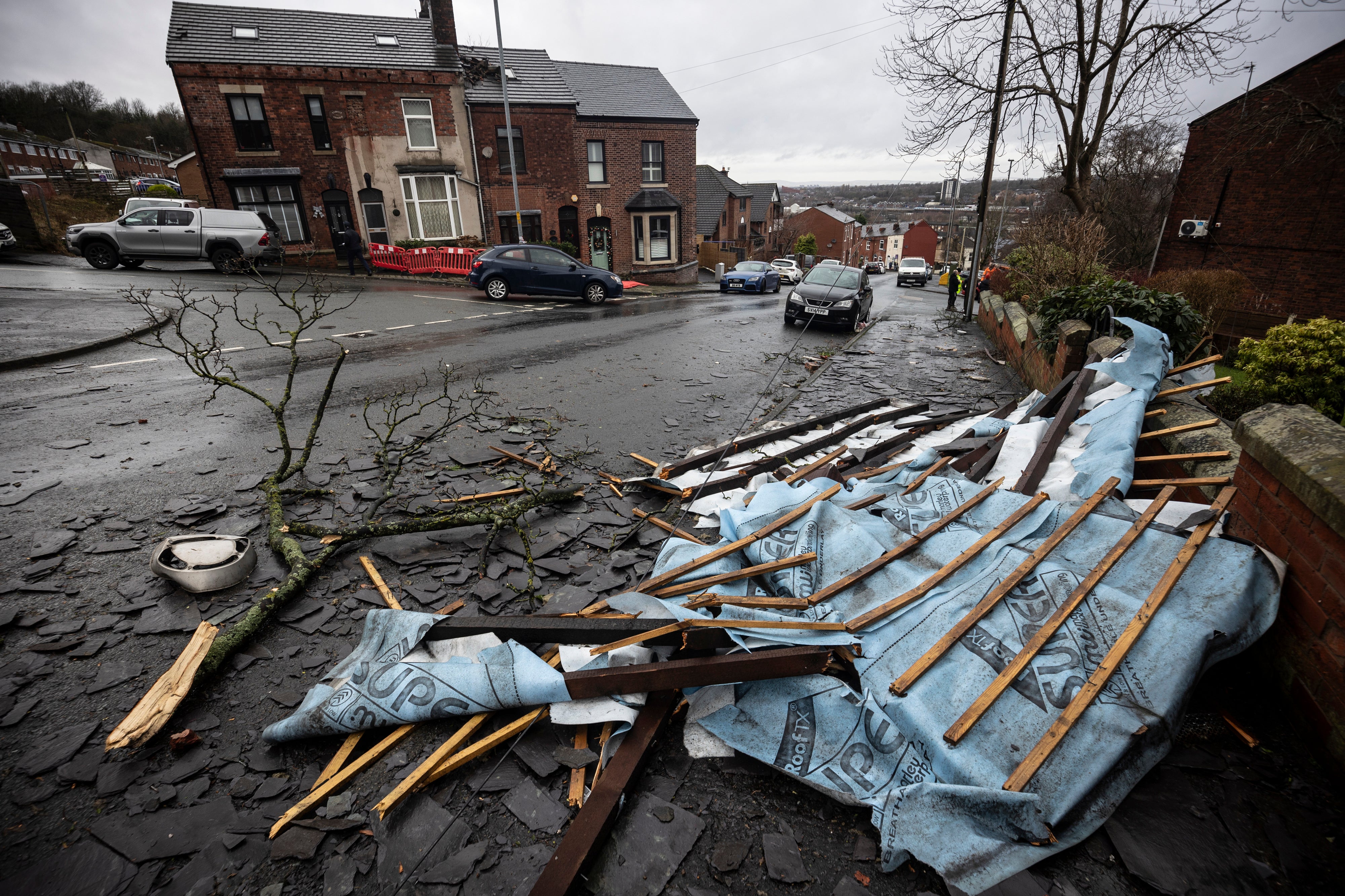 Part of a fallen roof lays on the floor following the suspected tornado in Stalybridge
