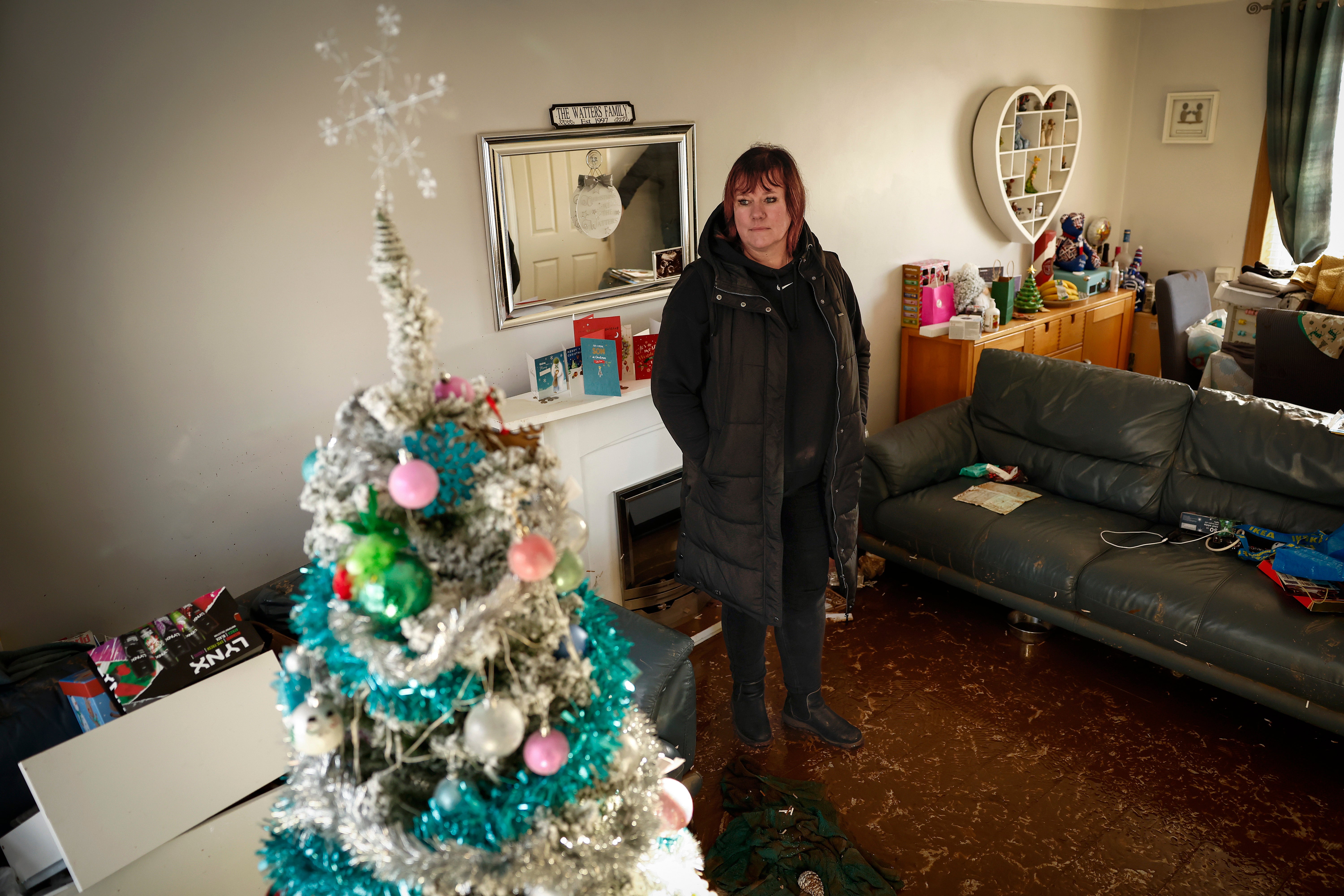 Carol Watters in her flooded home in Cupar