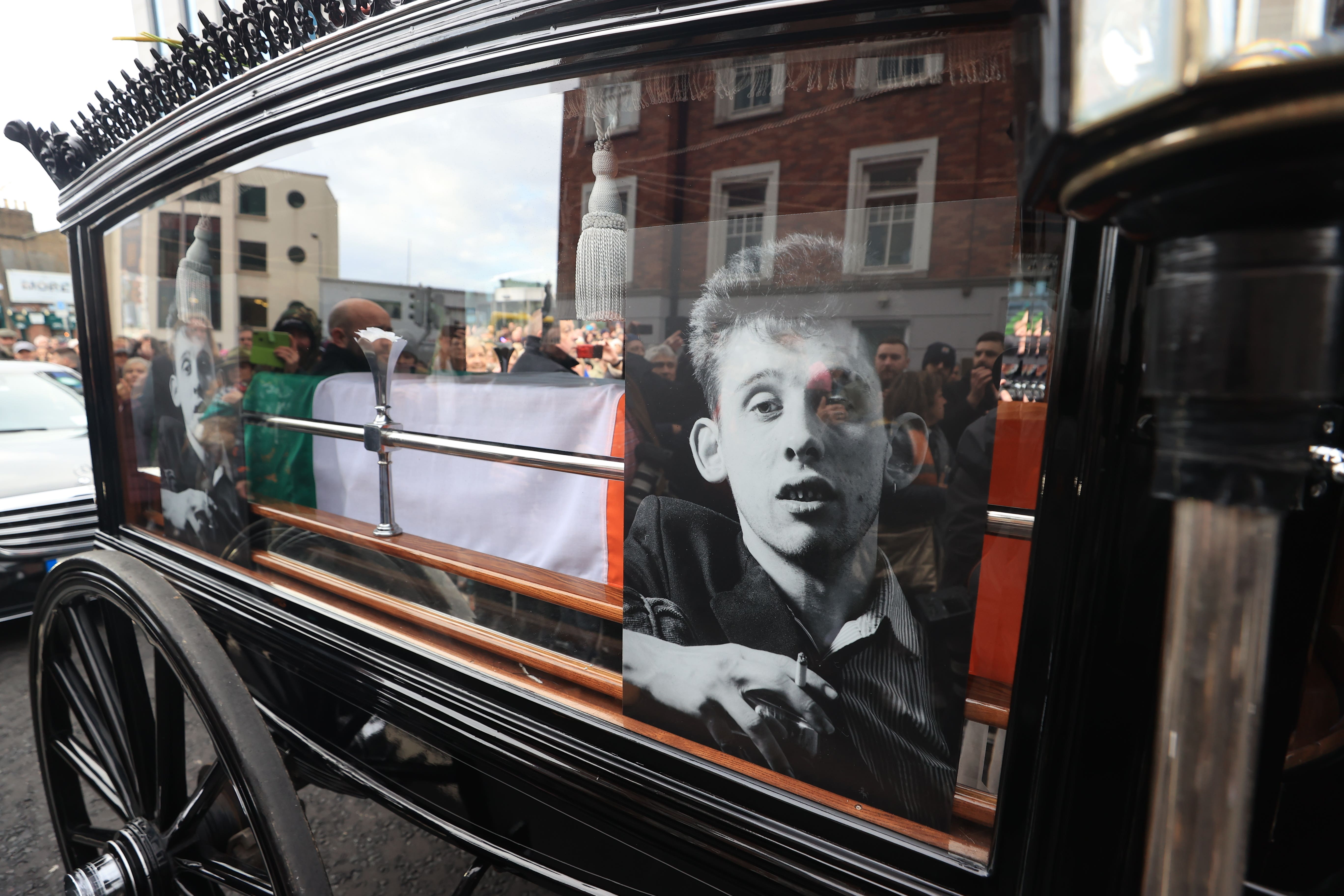 Members of the public lined the streets of Dublin in December to remember Pogues frontman Shane MacGowan, who died in November aged 65 (Liam McBurney/PA)