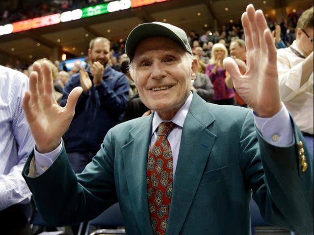 <p>Herb Kohl waves to fans during a Bucks game in April 2014</p>