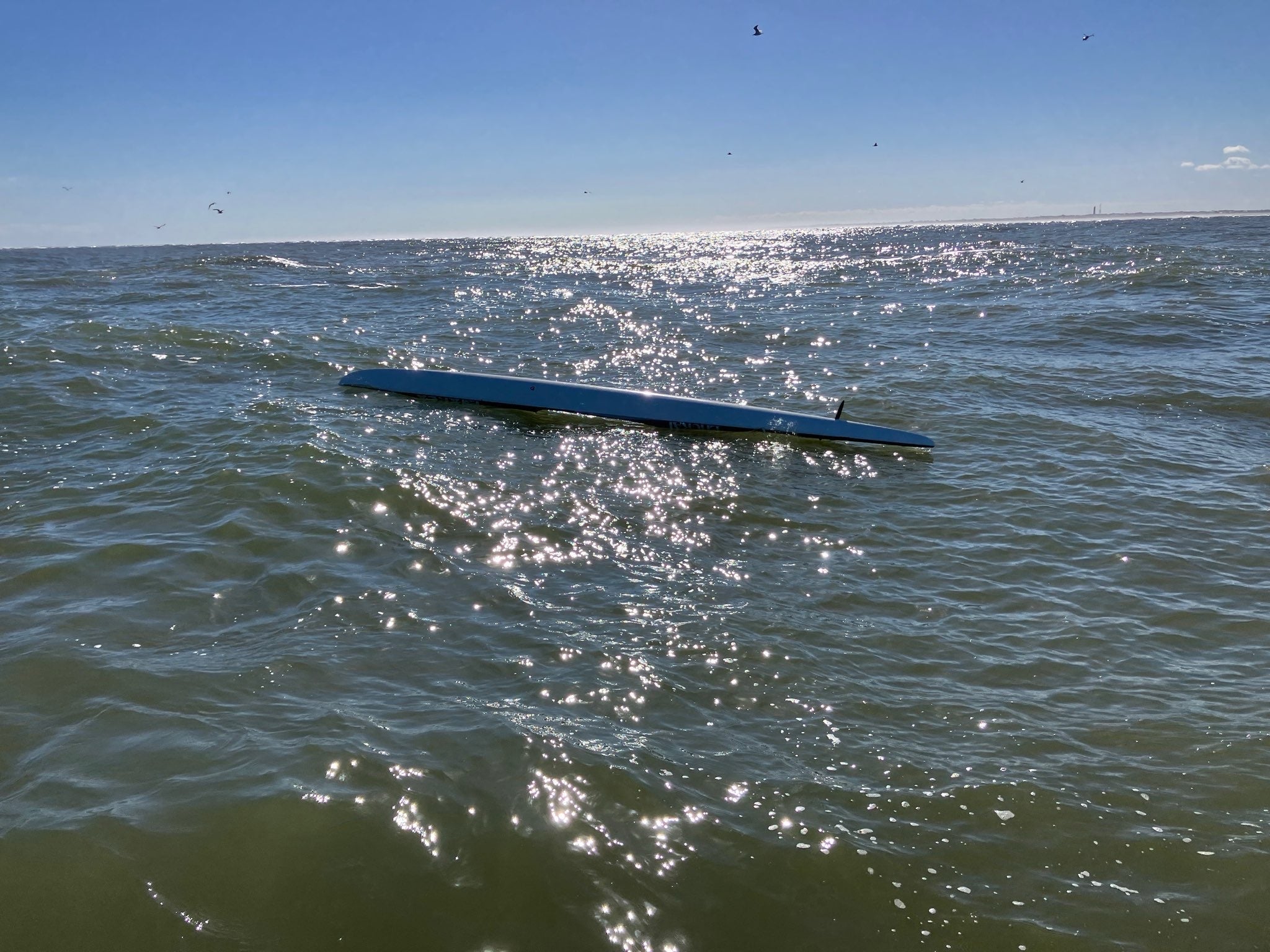 Eiffel Gilyana was last seen in a kayak — like this capsized one, shared by the US Coast Guard Southeast the day of his disappearance — not wearing a lifejacket