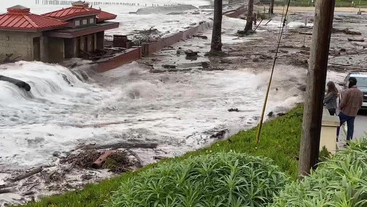 Waves thrash the Santa Cruz County coast